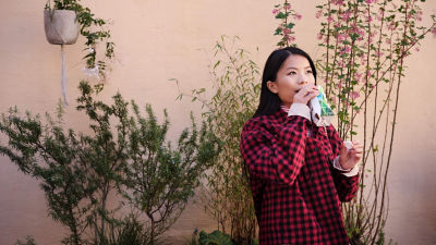 woman drinking from a carton