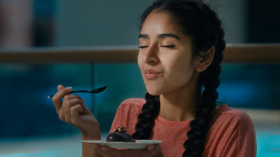 Woman eating dessert