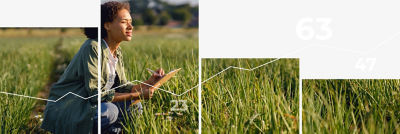 Woman in field with notebook
