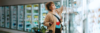 Woman shopping chilled food products