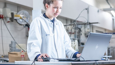 Food scientist in lab analyzing data