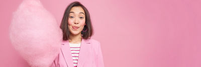 Woman in pink with cotton candy