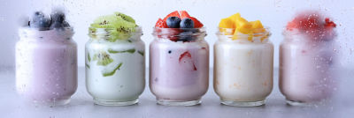 variety of yoghurt in glasses
