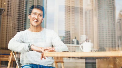 Young man in cafe