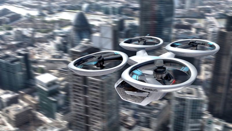 An Airbus air drone flies through the city