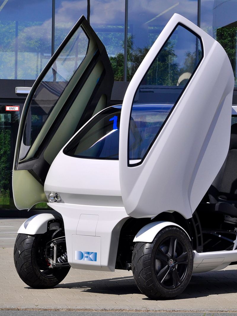 The “EO smart connecting car” electric vehicle has wing doors