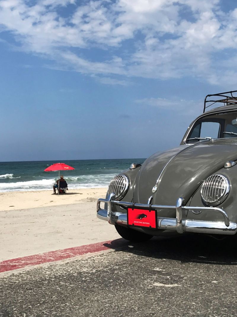 Classic VW Beetles parked at the beach.