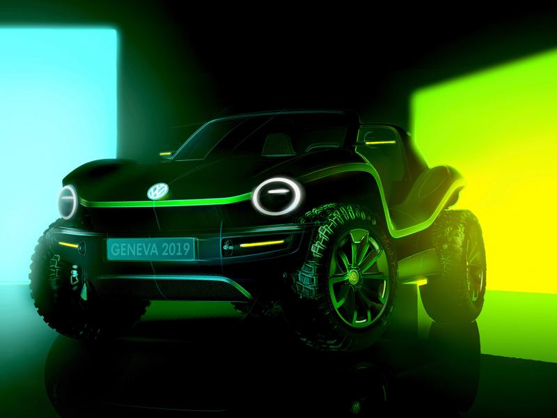 Le VW ID. BUGGY est situé devant des écrans lumineux, vert et bleu.
