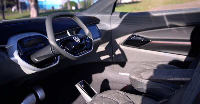 The interior of the ID. Crozz with the steering wheel and the gray, quilted seats