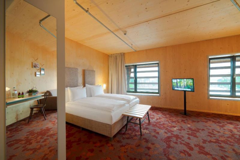 Wooden hotel bedrooms for low-impact tourism
