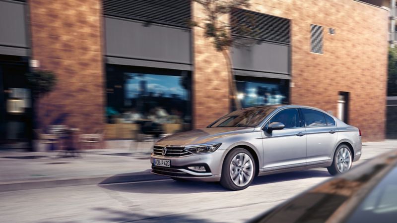 VW Passat saloon viewed in motion from the side