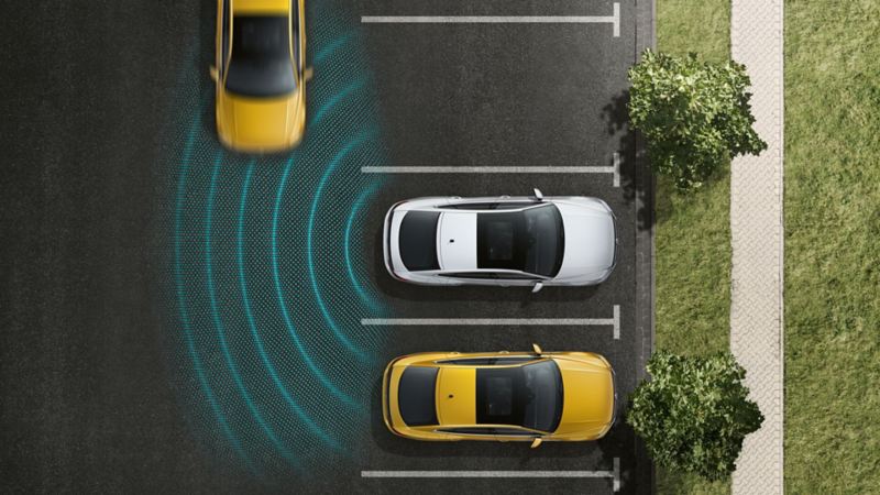 Rappresentazione grafica del funzionamento del 'Rear Traffic Alert' su una Volkswagen Arteon.