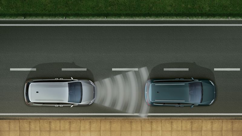 Dwa Volkswageny nocą widziane z góry. Sensoryka radaru mierzącego odległość przedstawiona liniami.