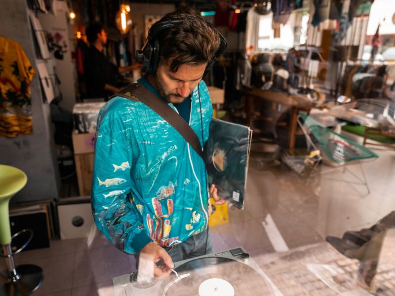 DJ Daniel Klein browses through a record store in Ibiza Town