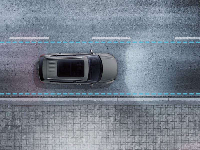 Illustration of a VW Tiguan Allspace driving on a road, lines symbolize the Lane Assist