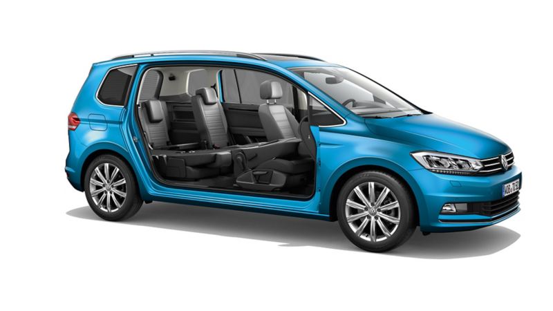 Zijaanzicht van een Volkswagen Touran zonder deuren met zicht op de drie stoelenrijen