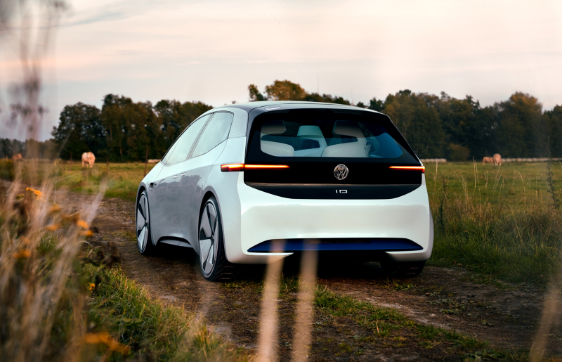 The ID. concept car is driving along a field path.