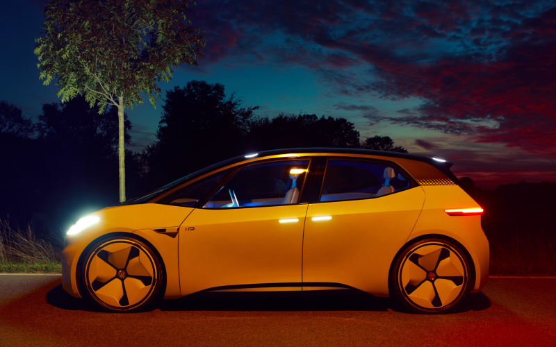 The ID. concept car in front of spectacular clouds.