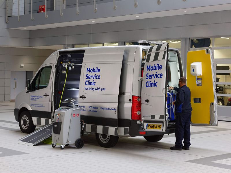 Mobile Servicing van in garage with mechanic