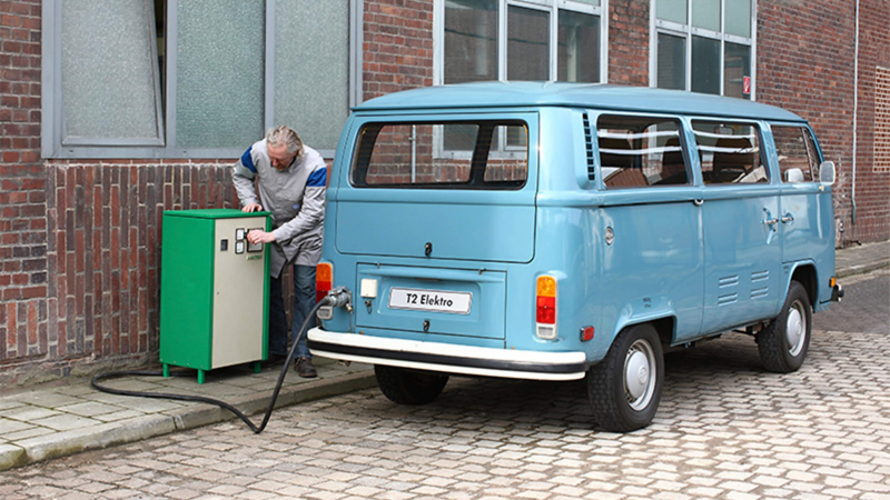 Man charging the e-Camper