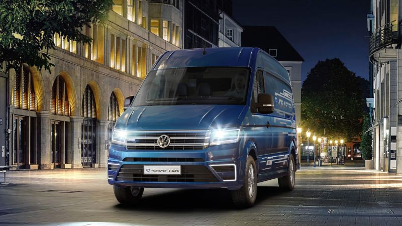 Blue Metallic paintwork Volkswagen e-Crafter city night drive