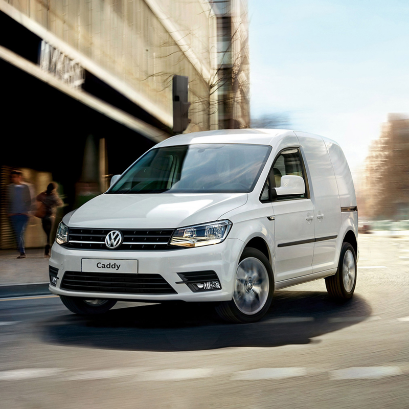 VW Caddy van in street