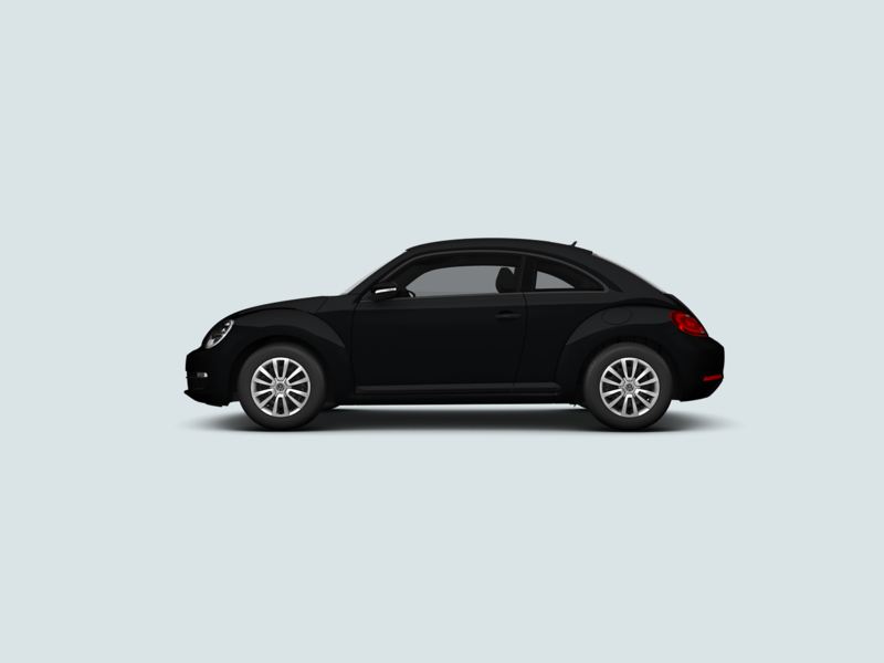 Profile view of a black Volkswagen Beetle..