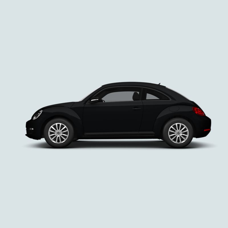 Profile view of a black Volkswagen Beetle..