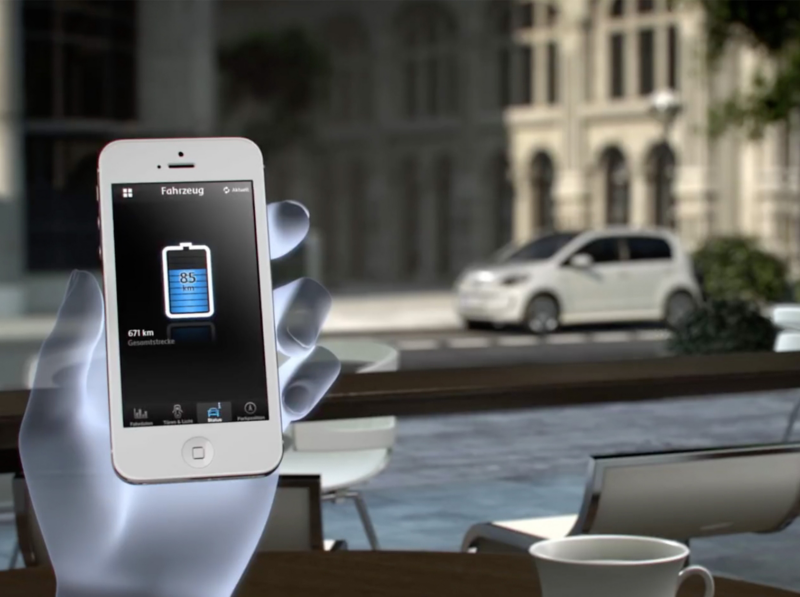 A translucent robotic hand holding a smartphone showing e-Remote.