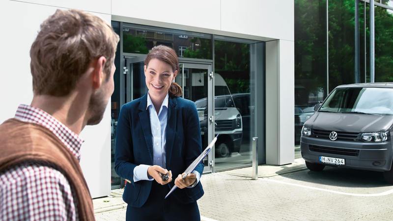 A VW Service Manager talking to a customer