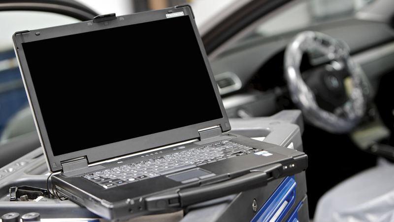 laptop and tools in VW van centre