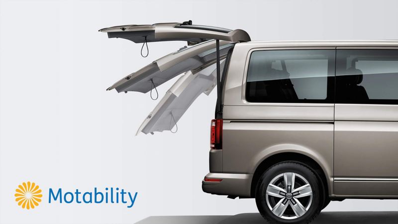 Volkswagen van with accessible rear door, with Motability logo