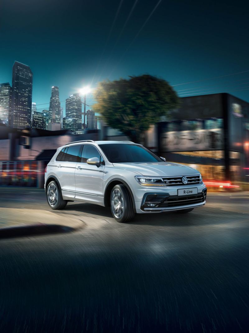 Action shot of the Volkswagen R-Line driving in the city
