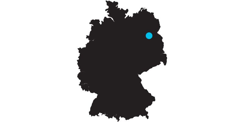 Outline of a map of Germany with a mark on the location of Berlin