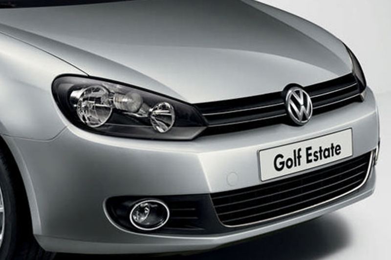 Front grill and badge shot of a silver Volkswagen Golf Estate.