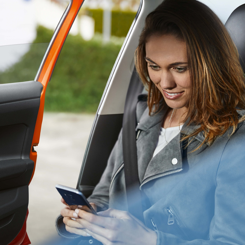 Woman on phone in car