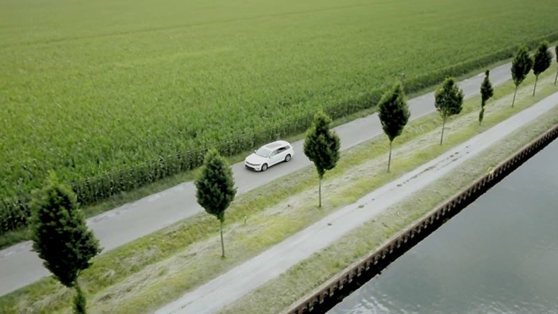 The e-Golf on a road beside a canal