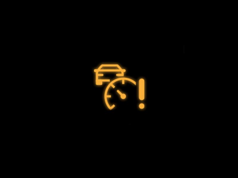cruise control symbol with exclamation mark