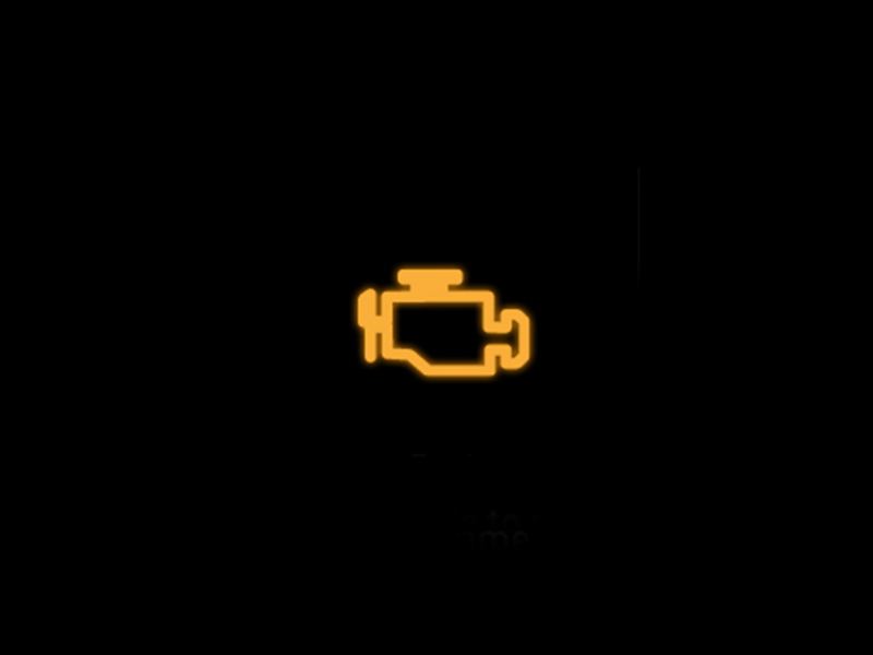 Yellow emission control/engine management warning light