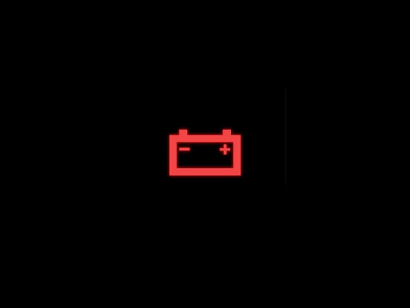 Red vehicle charging system warning light