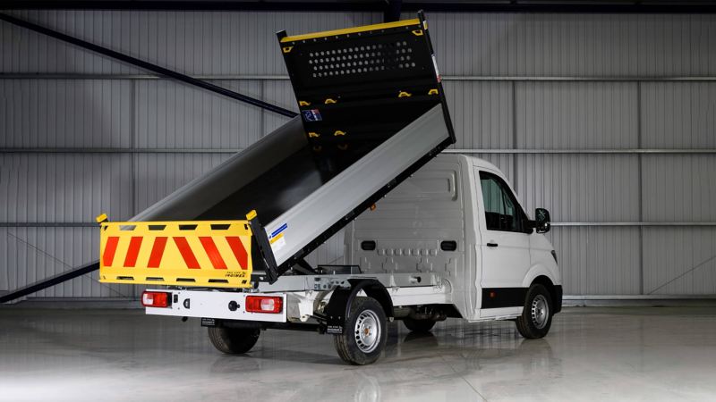 Rear view of crafter tipper, with rear tipping container open