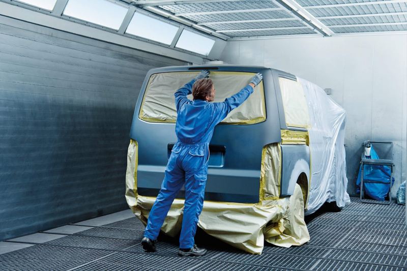 VW Transporter van being masked for painting