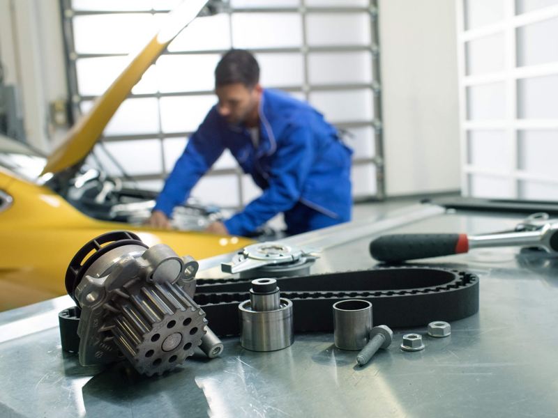 Technician working on a car