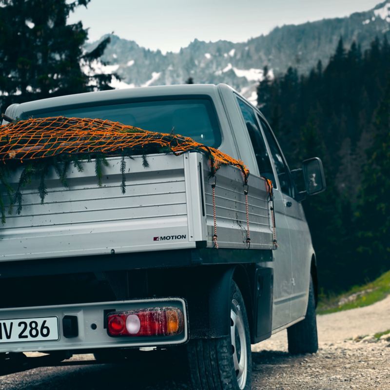 Camion à plate-forme de l'arrière avec filet de protection