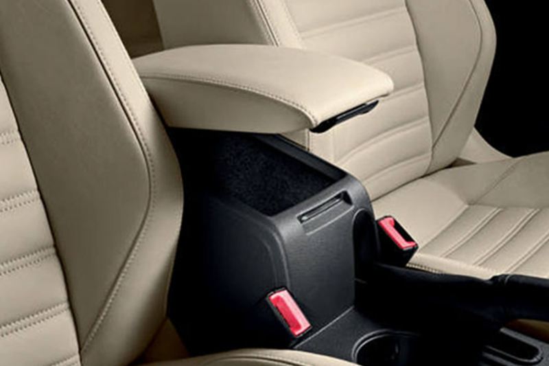 A Volkswagen Jetta storage compartment/arm rest between the front driver and passenger seats