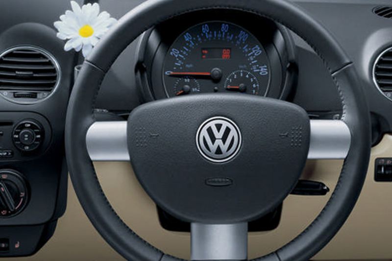 Interior shot of the Volkswagen Beetle Cabriolet, dash board and steering wheel