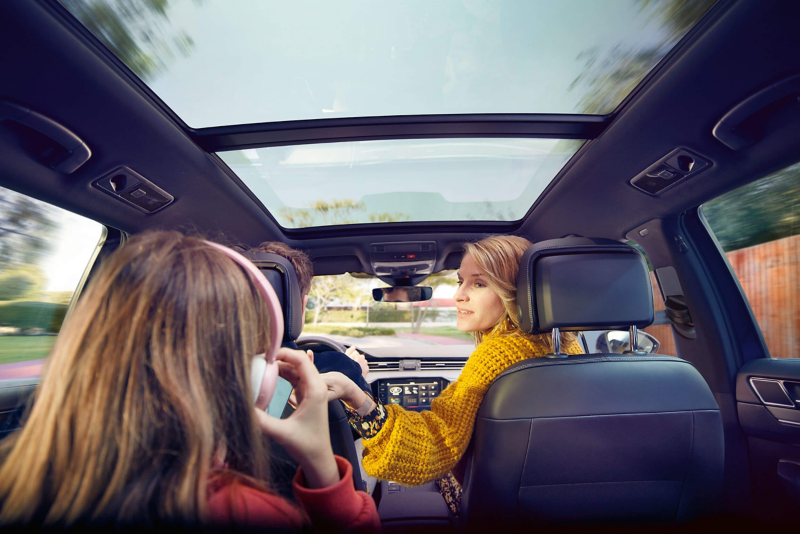 Family sintting in their Volkswagen Passat Estate