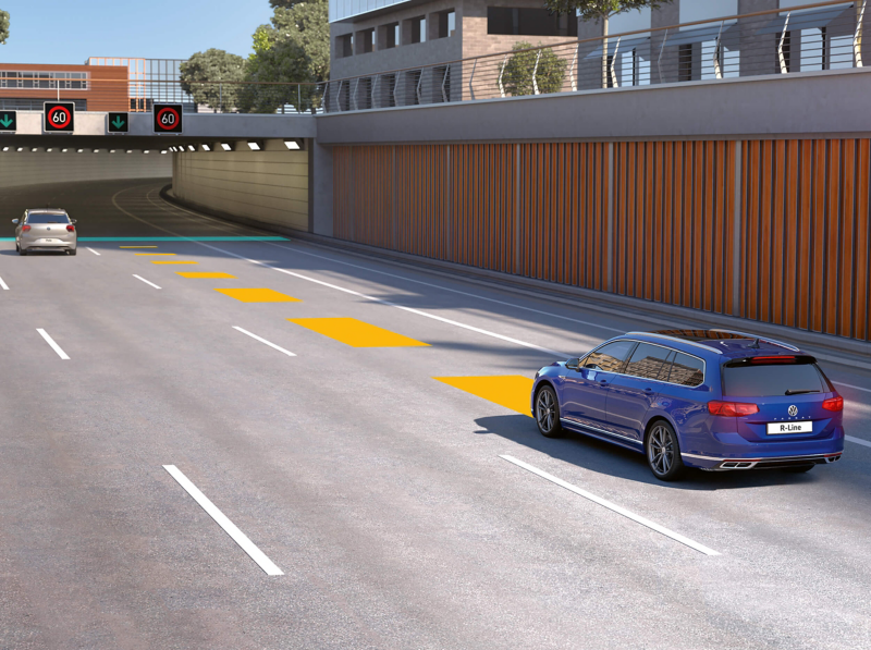 Adaptive Cruise Control being illustrated with a VW Passat on the road