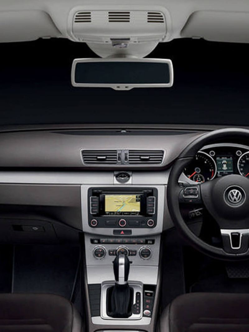 Interior shot of a Volkswagen Passat Estate, steering wheel and dashboard.