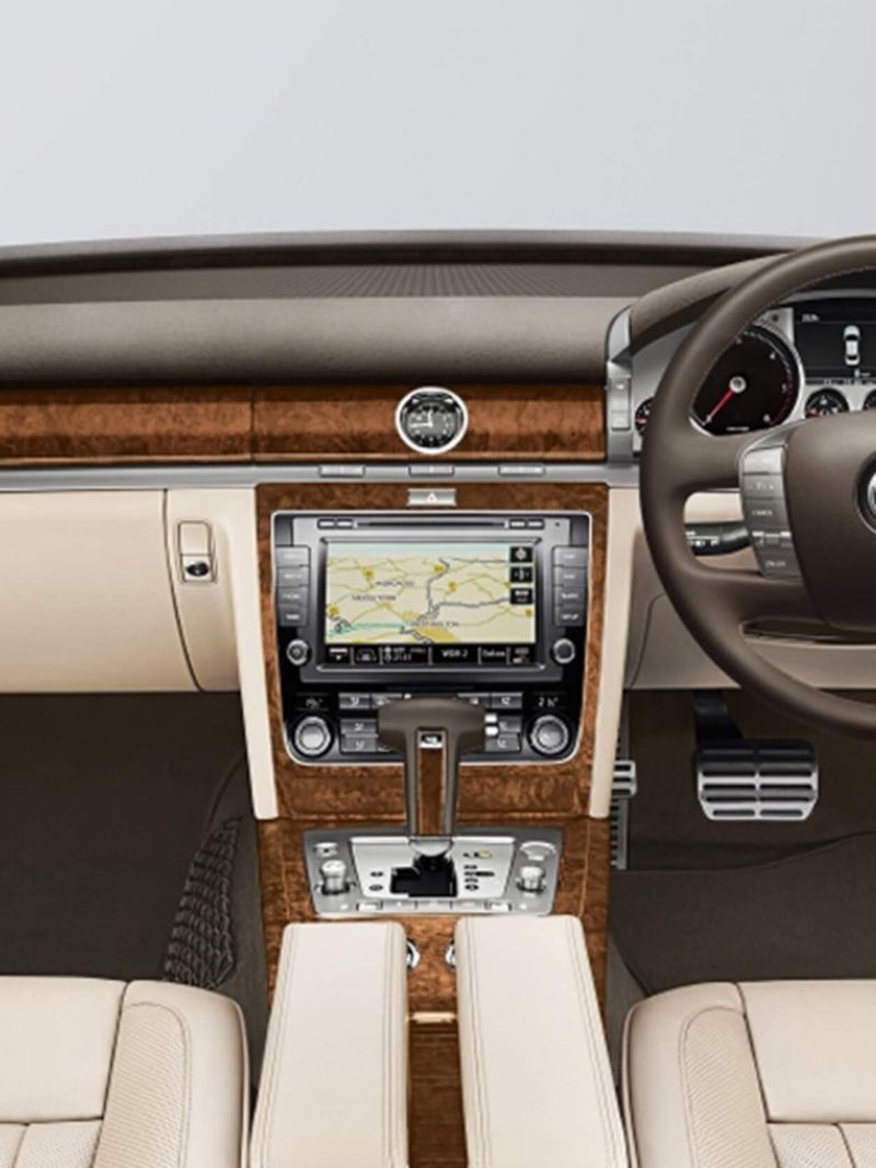 Interior shot of a Volkswagen Phaeton, steering wheel and dashboard.